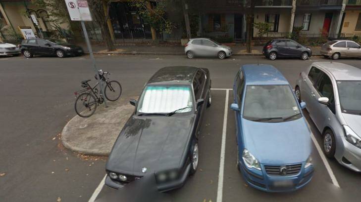 Google Street View from April, 2014 showing Mark Anderson's blue Volkswagen Polo in one of the set of eight permit zone parking bays on Leveson Street.  Photo: Google Maps