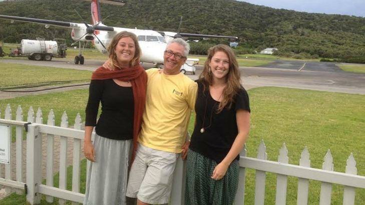Eliza (left) and Tess Arnold with their father Grant. Photo: Supplied.