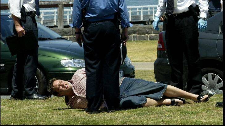 Carl Williams is arrested on Beaconsfield Parade, Port Melbourne.  Photo: Angela Wylie