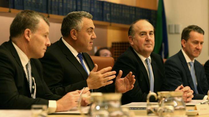 Mr Hockey met state and territory treasurers in the cabinet room at Parliament House in Canberra on Friday. Photo: Andrew Meares