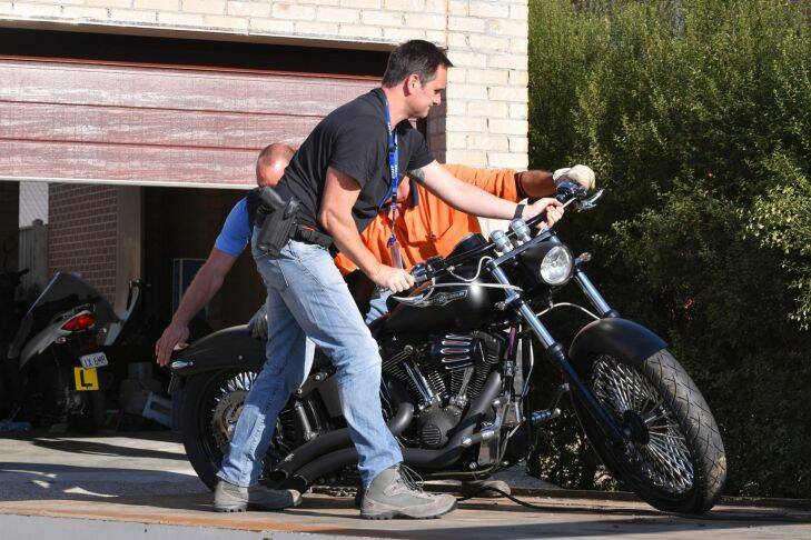 Police, including detectives from Echo Taskforce, have executed a number of warrants this morning as part of an operation targeting the Comancheros OMCG. They did search a property in Lynhurst and took away a 4WD , Harley Davidson as well as some evidence from the property. 14 March 2017. The Age News. Photo: Eddie Jim. Photo: Eddie Jim
