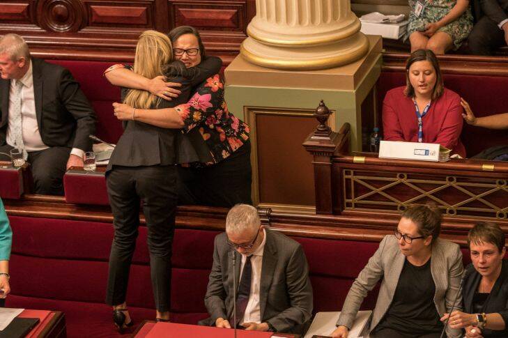 Members of the Victorian Upper house celebrate with hugs and tears of joy after a marathon 29 hours sitting to pass the Voluntary Assisted Dying Bill. 22nd November 2017. Photo by Jason South