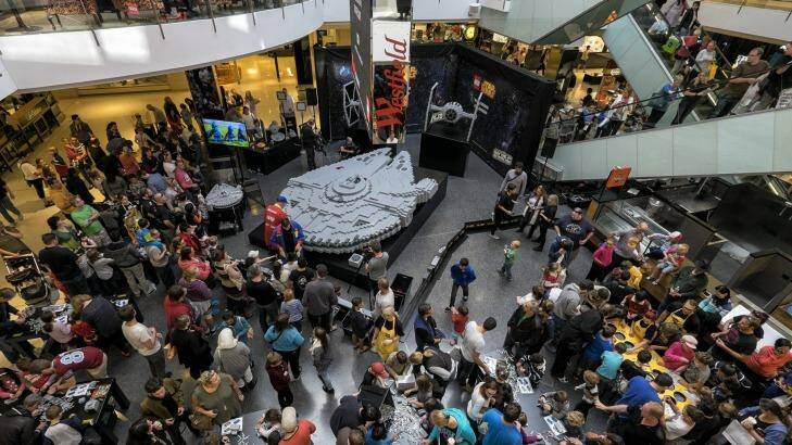 Fans are in hyperdrive mode to put together the Millennium Falcon at Westfield Southland. Photo: Luis Ascui