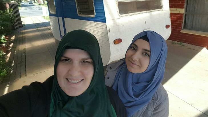 Betul Tuna (left) and her business partner Suzan Yilmaz with their 'caravan cafe', which they hope will become a meeting place in Shepparton for people of different faiths. Photo: Supplied 