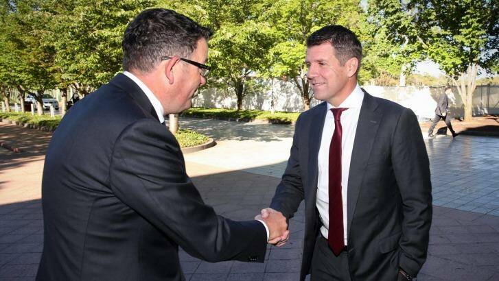 Victorian Premier Daniel Andrews greets NSW Premier Mike Baird ahead of COAG in Canberra on Friday. Photo: Andrew Meares
