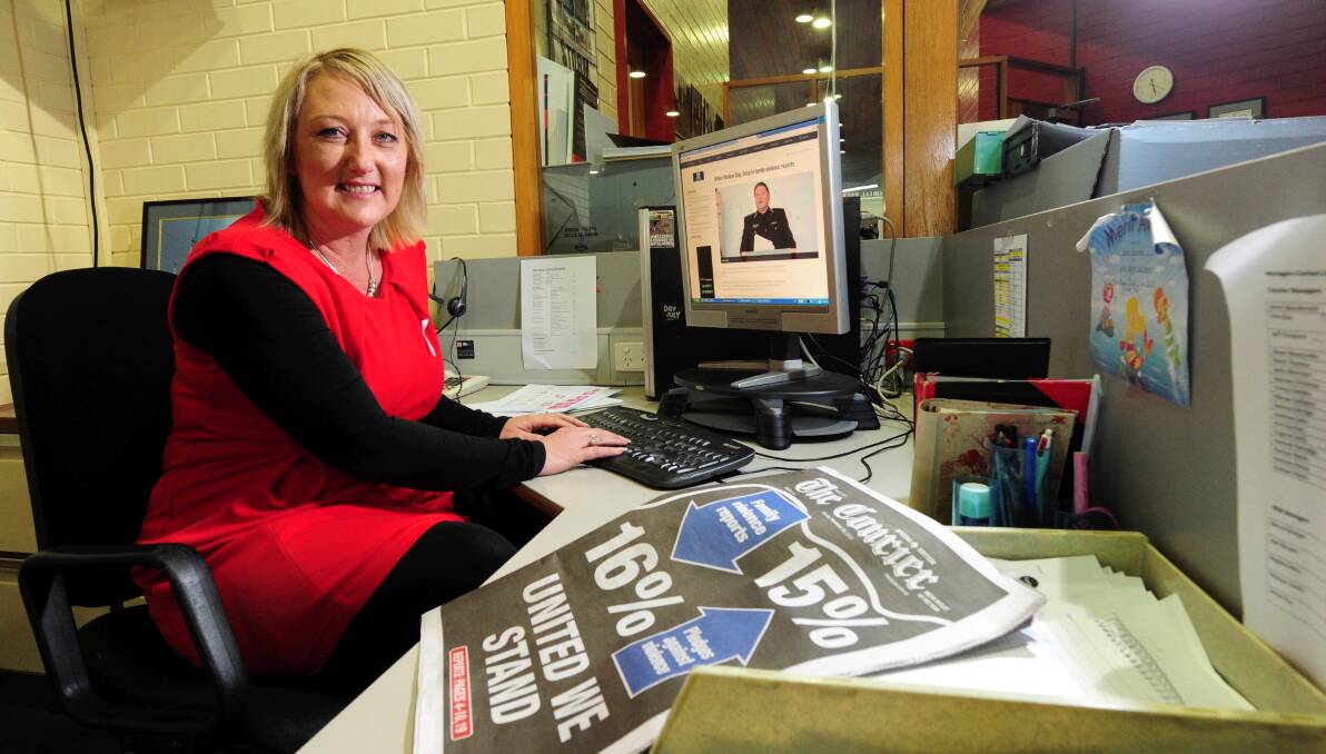 Kim Quinlan at work. for White Ribbon Day campaign *** Local Caption *** Kim Quinlan