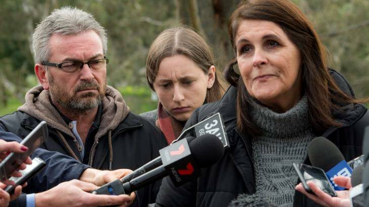 Patricia Gray, flanked by Karen's husband Borce and daughter Sarah, made the family's last public appeal for help. Photo: Penny Stephens