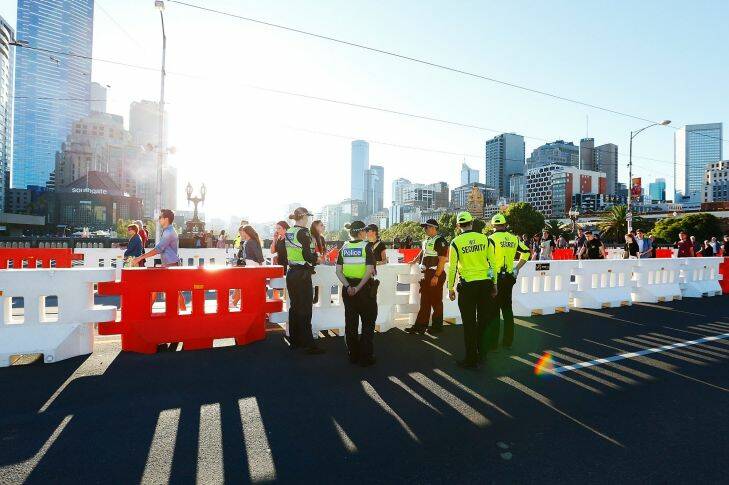 MELBOURNE, AUSTRALIA - DECEMBER 31:  Police out in force early in the CDB, ahead of the New Year's Eve celebrations, as seen here on the Princes Bridge on December 31, 2016 in Melbourne, Australia.  (Photo by Daniel Pockett/Fairfax Media)