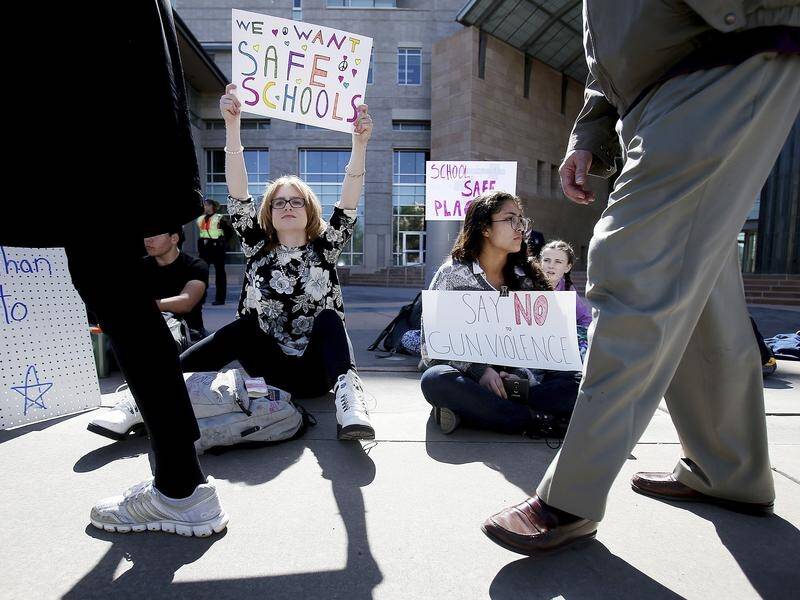 High school students across the US are building momentum with protests demanding gun control.