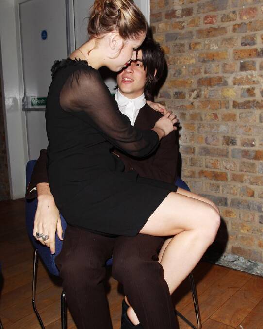 Peaches Geldof sits on the lap of her husband, Thomas in 2011. Photo: Fergus McDonald