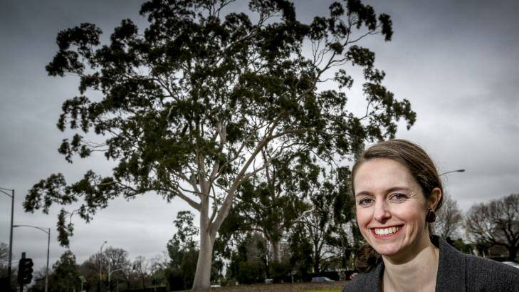 The National Trust's Anna Foley in front of lemon-scented gums in Carlton.  Photo: Eddie Jim