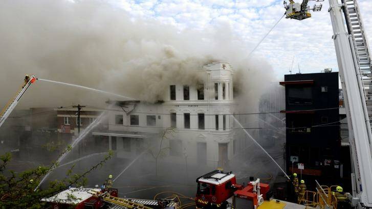 Firefighters battle the blaze engulfing the Albion Hotel on October 5. Photo: Penny Stephens