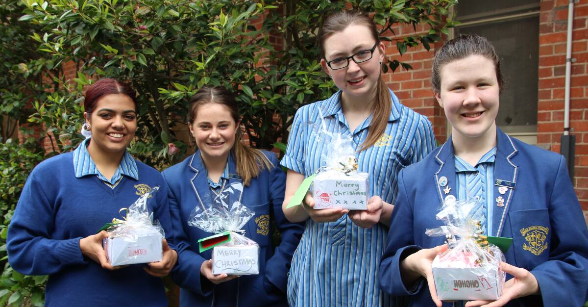 HOMEMADE GOODS: Thiil Jones, Samara Beaston, Ebony Costigan and Zoe Sharpe from Loreto College with their Christmas gifts. Picture: Supplied