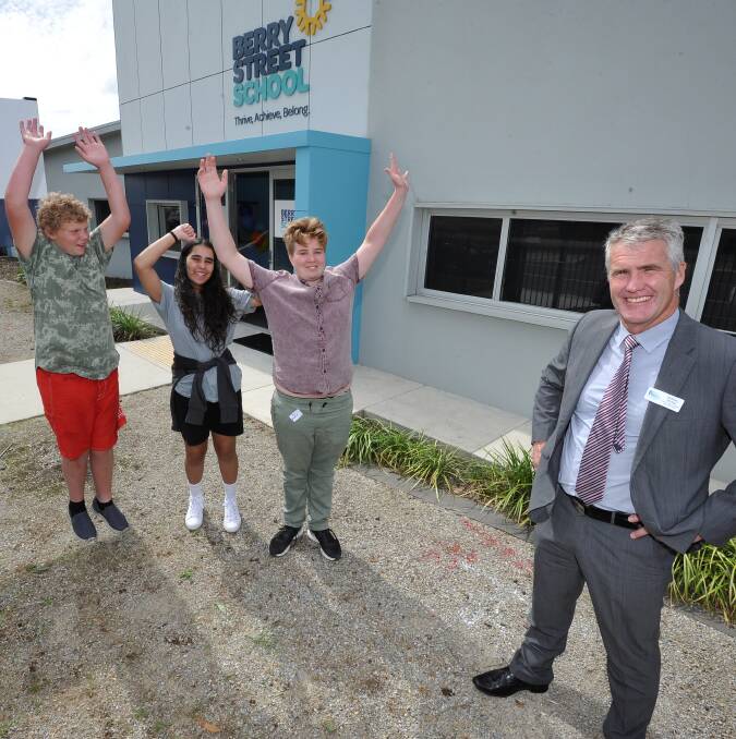 Berry Street School students Jordan,14, Cheyenne, 14, and Alex, 13, with head of campus Damian McKee. Picture: Lachlan Bence
