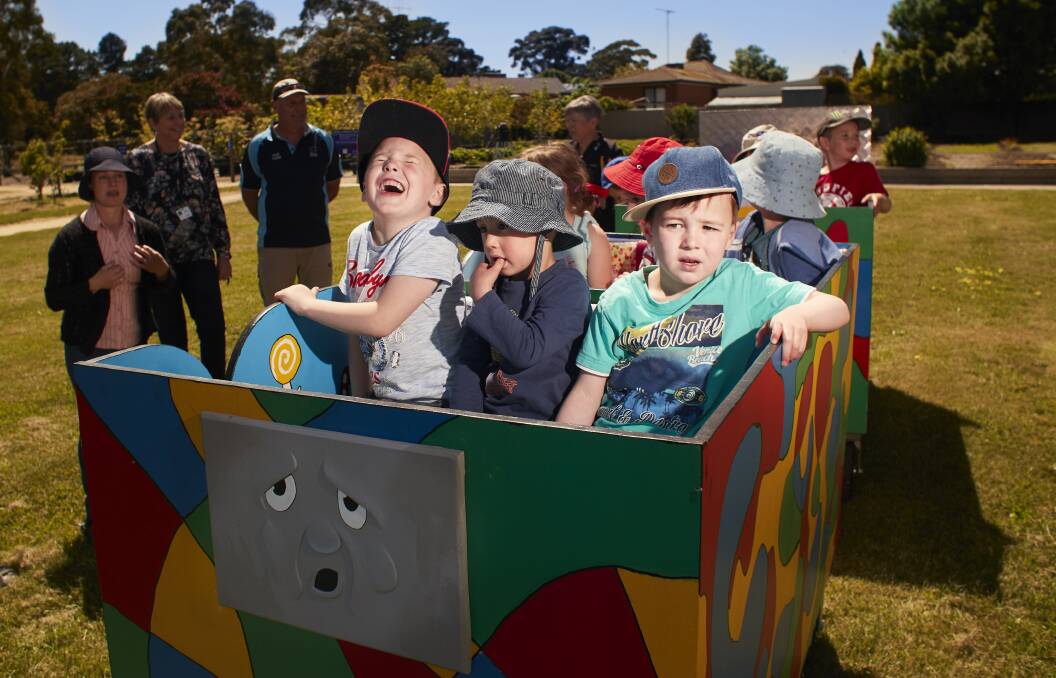 TOOT TOOT: Oliver, Flynn and Dylan were among the first to ride the Ballarat Express train at the Ballarat Specialist School farm thanks to the hard work from participants of the Work for the Dole project. Picture: Luka Kauzlaric