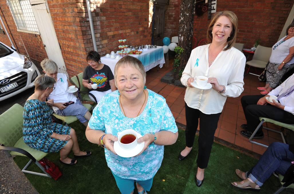 Dot Cherry and Ballarat MP Catherine King enjoyed a morning "teal" for Teal Ribbon Day. Picture: Lachlan Bence
