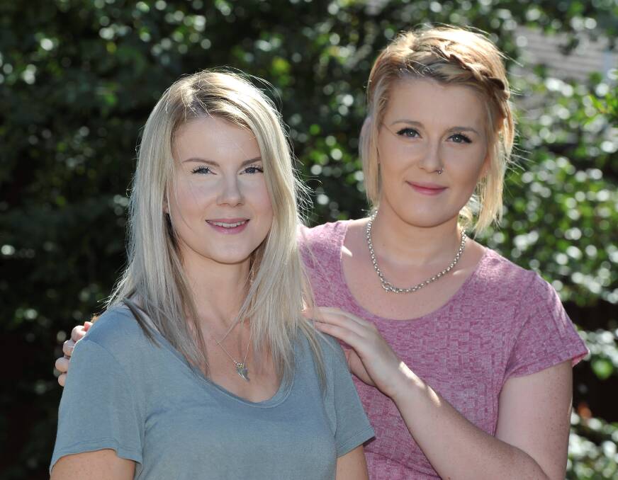 UNITED: Sisters Emma and Georgina Hussey have organised a garage sale to raise funds for local organisation Survivors of Suicide. Picture: Lachlan Bence 