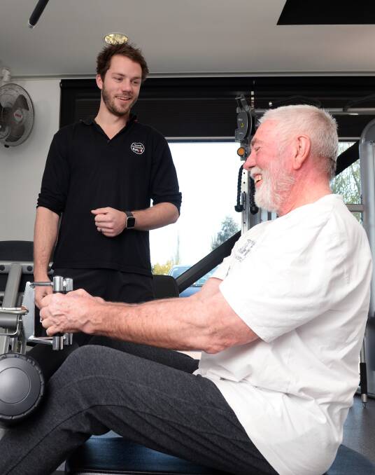 HEALTHY LIVING: Gym trainer Jarrod Parsons works with Geoff Roxburgh at Ballarat Community Health ahead of the Healthy Ageing Expo. Picture: Kate Healy