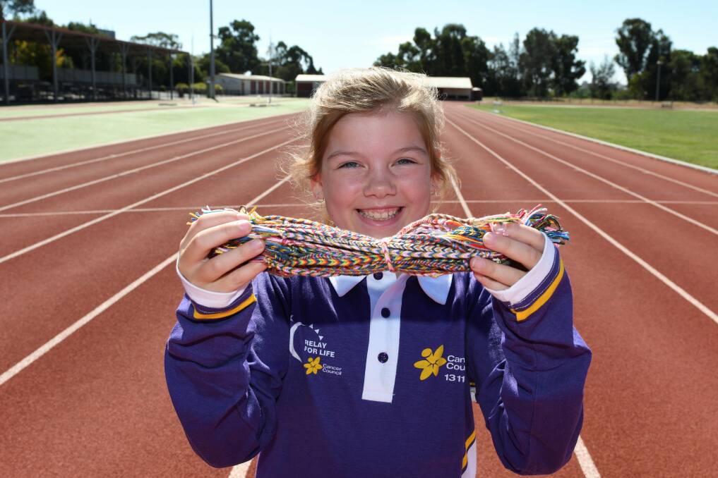HARD AT WORK: Summer Devine, 9, is hoping the community can get behind her efforts to raise more funds for the Cancer Council. Picture: Lachlan Bence  