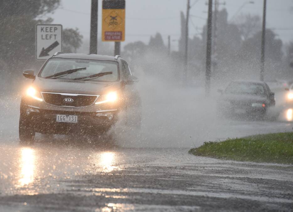 Creswick road covered in rain in June 2016. Picture: Lachlan Bence