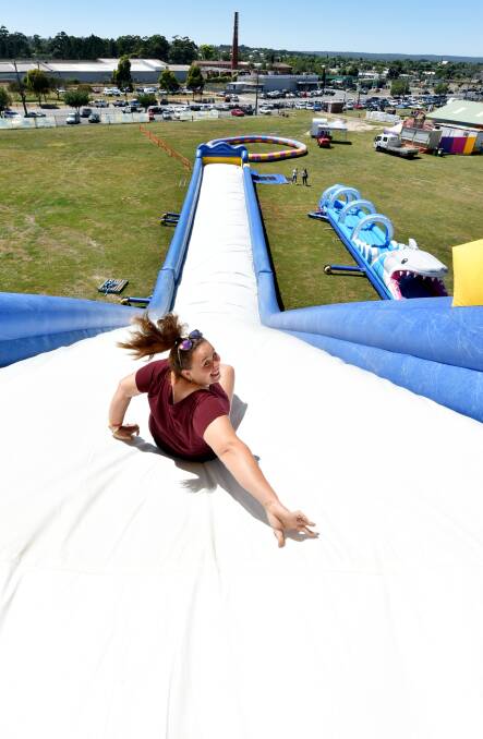 Splash'N'Bounce operator Sarah Wills on the 10-metre water slide Godzilla. Picture: Jeremy Bannister.