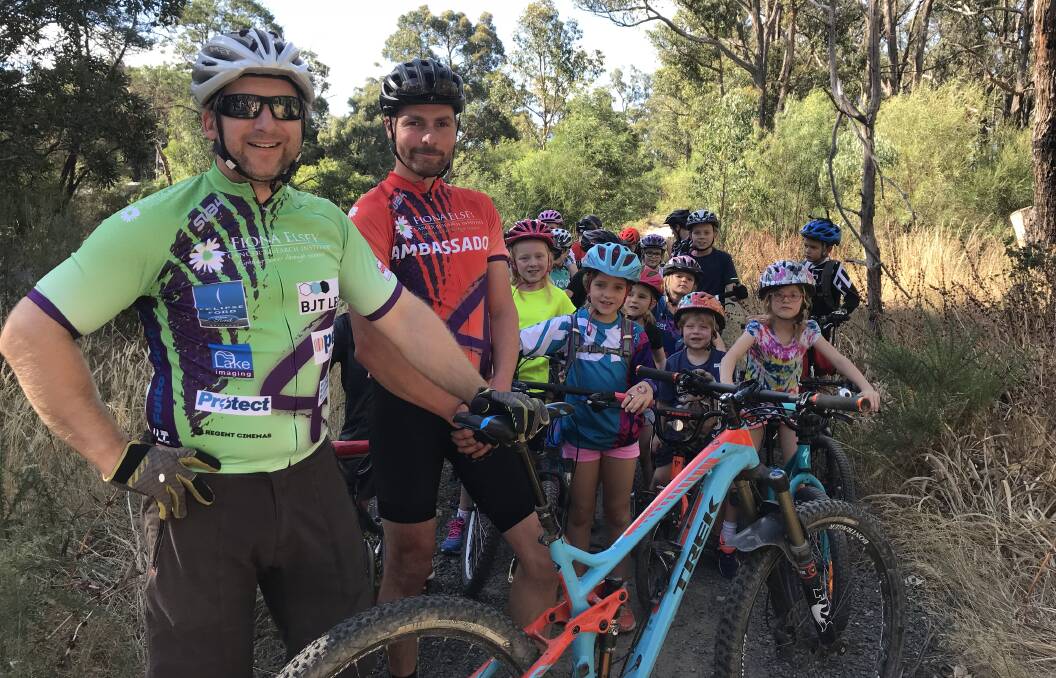 READY, SET, RIDE: Course coordinator Antanas Spokevicius and ambassador Phil Orr with a group of excited children. The Ballarat Cycle Classic has options for all ages. Picture: Supplied. 