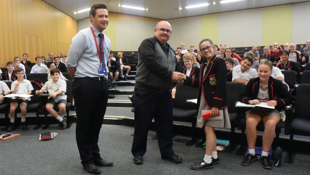 INFORMATIVE: Peter Livingston, councillor Des Hudson and year 6 pupil Claire Lightfoot at Ballarat Clarendon College.