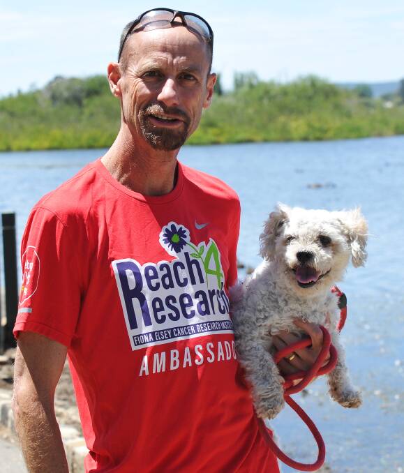 FURRY FRIEND: Steve Moneghetti and his dog Davey are ready to take on the pet-friendly family lake run and walk, which takes place around the picturesque Lake Wendouree as part of the Cycle Classic. Picture: Lachlan Bence