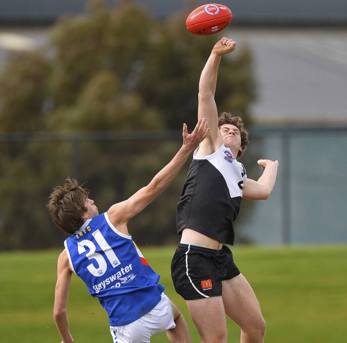 RESTED: Rebels' Lloyd Meek, pictured here against Eastern Rangers' Nathan Mullenger-Mchugh, is being managed for his Vic Country game. Picture: Dylan Burns