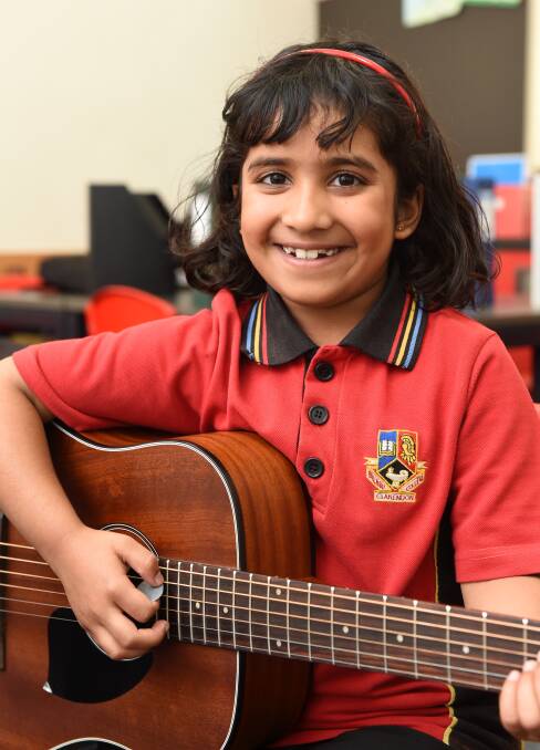 Eight-year-old Chloe Yeluri wins second place in a national songwriting competition for her song The ANZACs. Picture: Lachlan Bence