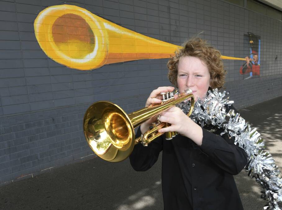 CHRISTMAS CHEER: Phillip, 14, is a trumpet player from Nagle College in Bairnsdale, who performed with his school in Ballarat on Thursday. Picture: Lachlan Bence