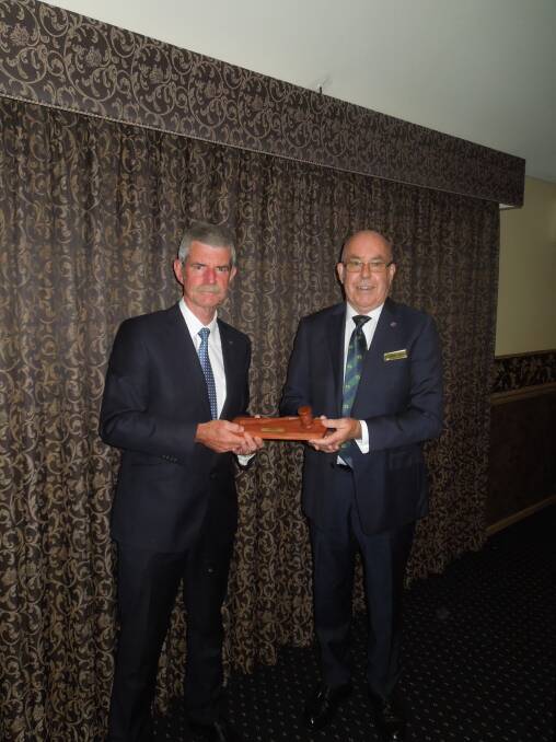 Victims of crime commissioner Greg Davies was presented with a gavel by Ballarat branch chairman Bryan Nicholls.