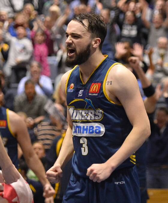 CELEBRATION: Ballarat Miners captain Peter Hooley with the crowd erupting behind him after a semi final victory over Hobart. Picture: Dylan Burns