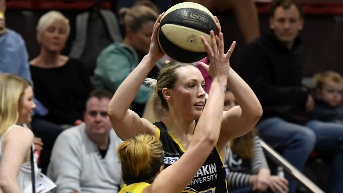 NATIONAL TALENT: Melbourne Boomers' Maddie Garrick looks to pass the ball in the exhibition match against Bendigo Spirit at the Minerdome on Friday. Picture: Lachlan Bence