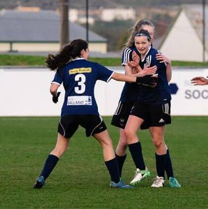 SO CLOSE: The Strikers, pictured here in a match against Essendon Royals in July, fought hard against Eltham, but it was not enough to secure their spot.