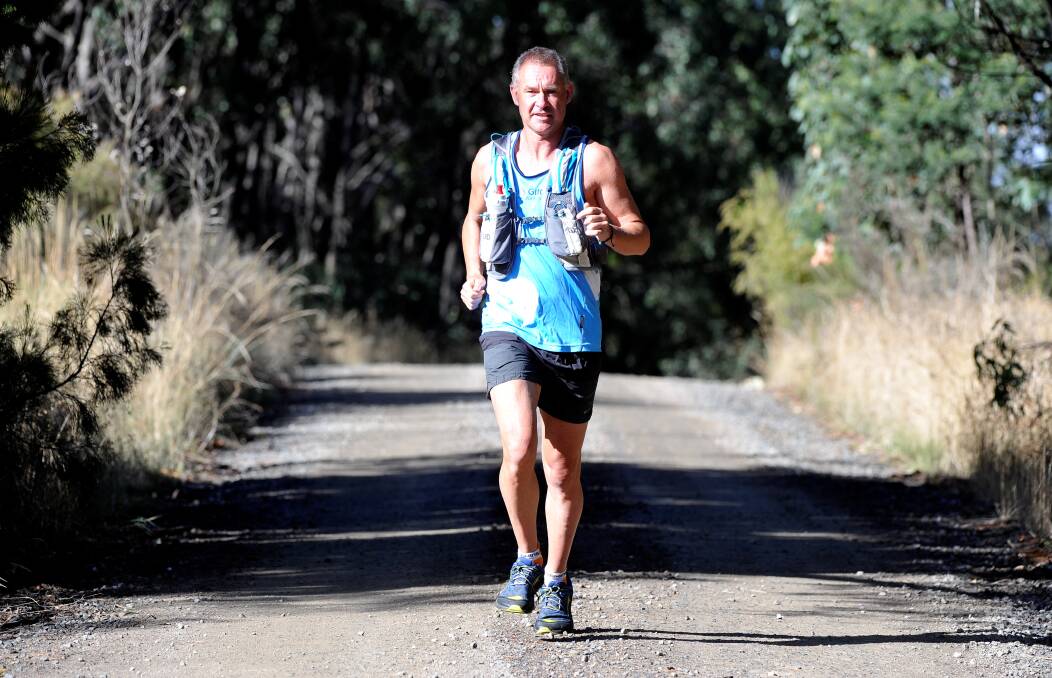 ADVENTURER: Local Mick Marshall has set out to do what he believes is the toughest race in Australia, covering 217km through rocky and hilly terrain in under 40 hours. Picture: Lachlan Bence
