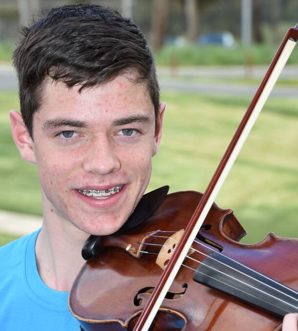 YOUNG TALENT: Ballarat Grammar student Jonathon Yates participated in a four-day regional Suzuki violin workshop at Damascus College this week. Picture: Lachlan Bence