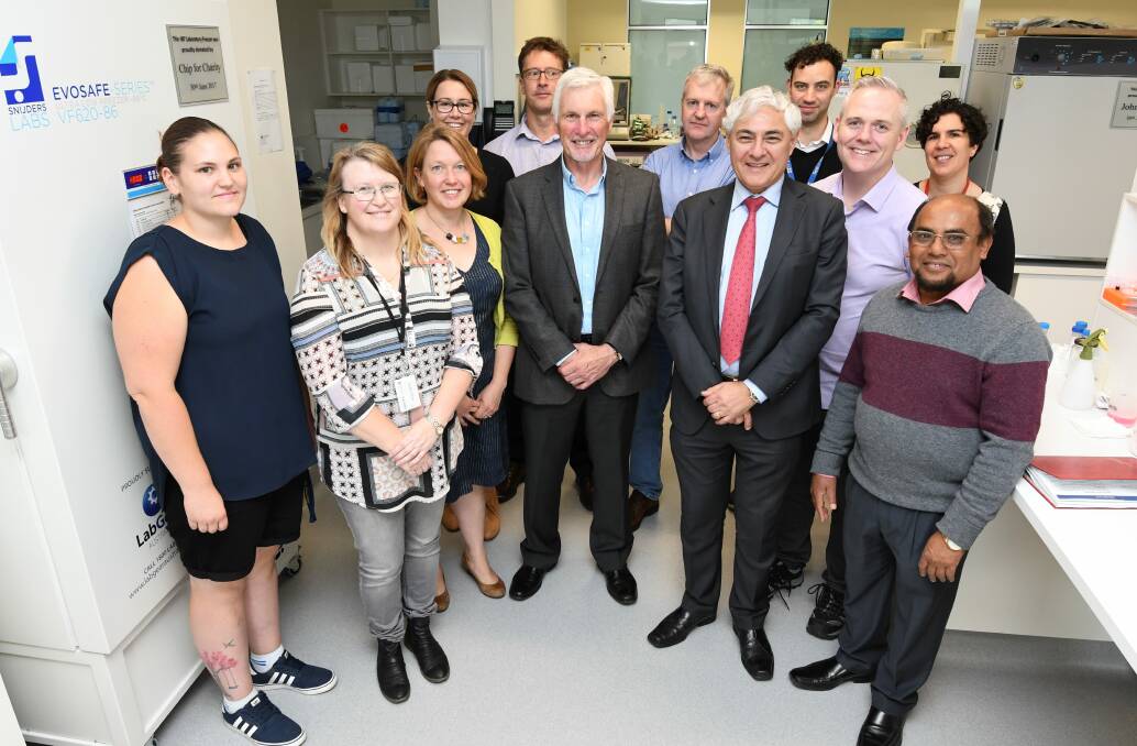 The team at the Fiona Elsey Cancer Research Institute with Mick Malthouse. Picture: Lachlan Bence