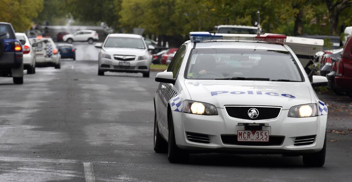 Staff were threatened with a gun and axe handle at a Wendouree venue on Monday morning. 