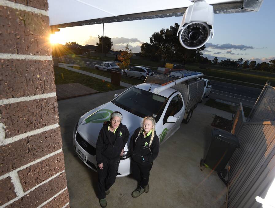 Electrician Kylie Slade, pictured with daughter Chelsea, installed a new  security system in light of the recent tradie thefts. PICTURE: JUSTIN WHITELOCK
