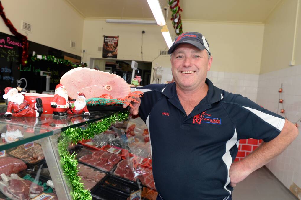 Meat n More's Mick Haintz says his pineapple cured hams are popular in the lead up to Christmas. PICTURE: KATE HEALY