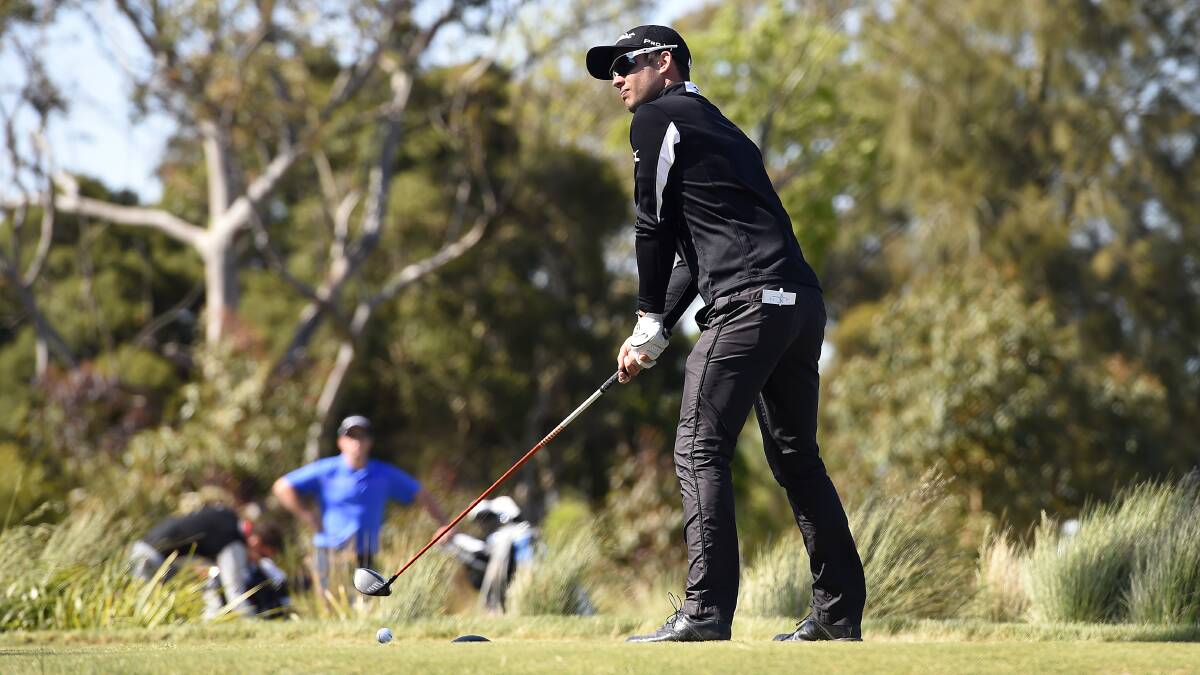 In control: Adam Demidjuk mastered fierce Ballarat winds on Tuesday morning to shoot one-under par in the first round of the National Futures Championship. PICTURE: JUSTIN WHITELOCK