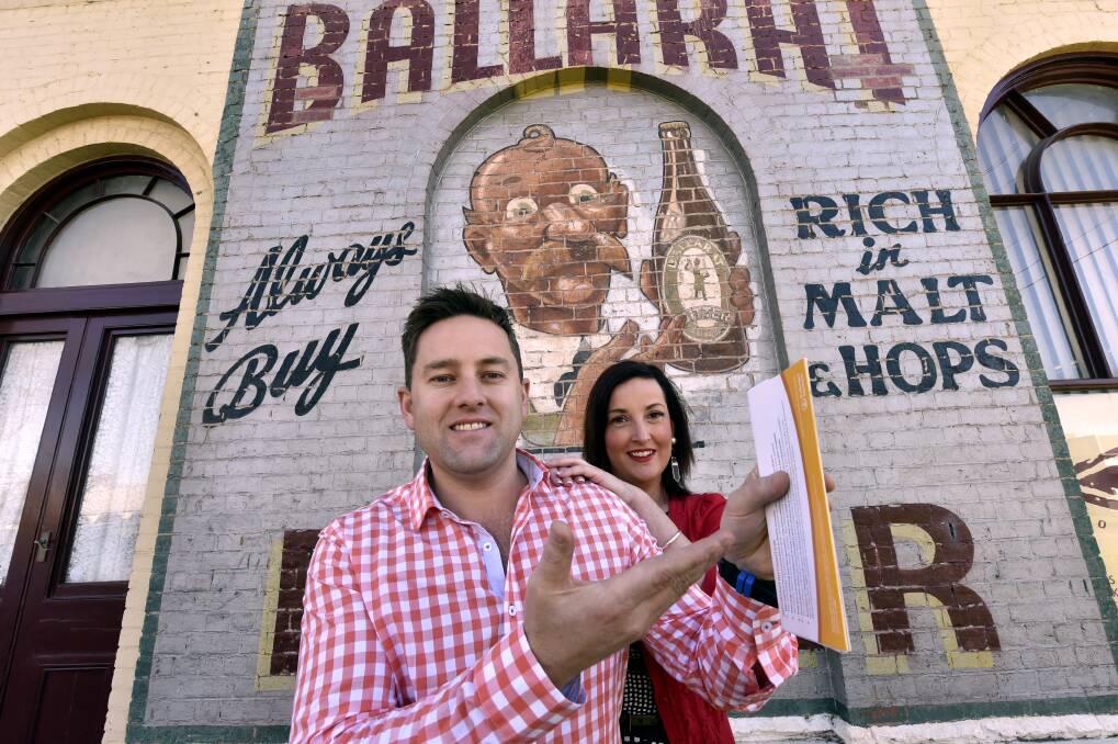 Getting in early: Ballarat Beer Festival directors Tim Kearney and Kate Burrows with some early bird tickets for the beer extravaganza, which went on sale on Monday. PICTURE: JEREMY BANNISTER
