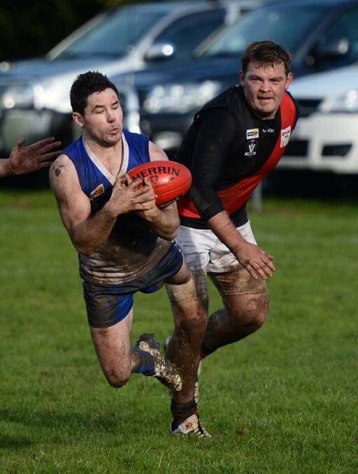 Return: Buninyong defender Tyler Dittloff (right) is back for his first game since injuring a shoulder against Bungaree last month. PICTURE: ADAM TRAFFORD
