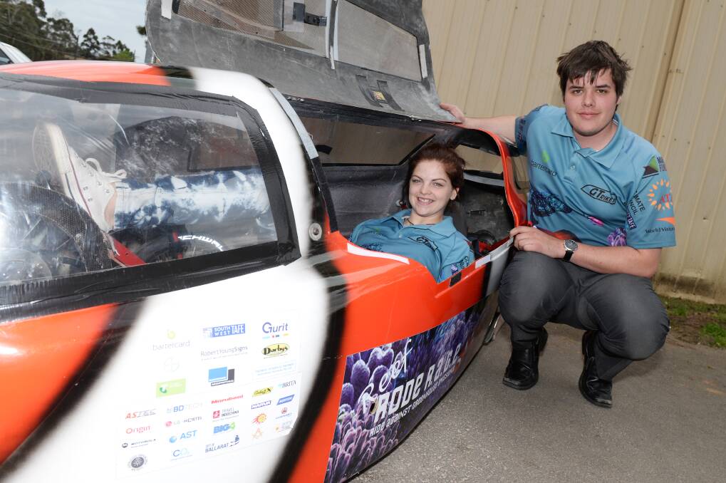 Pedallers: Rode R.A.G.E team members Chloe Ridge-Burns and Zac McKee with their vehicle, Nemo. PICTURE: KATE HEALY