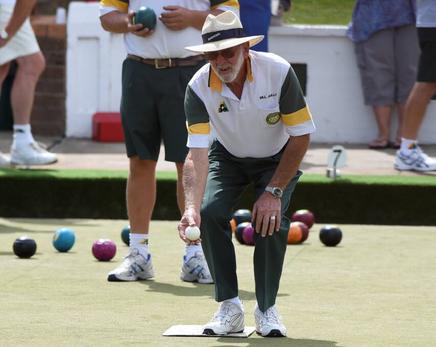 Concentration: Buninyong’s Bill Jolly prepares to send down the jack in the Ballarat District Bowls Division four final against Midlands. PICTURE: LACHLAN BENCE