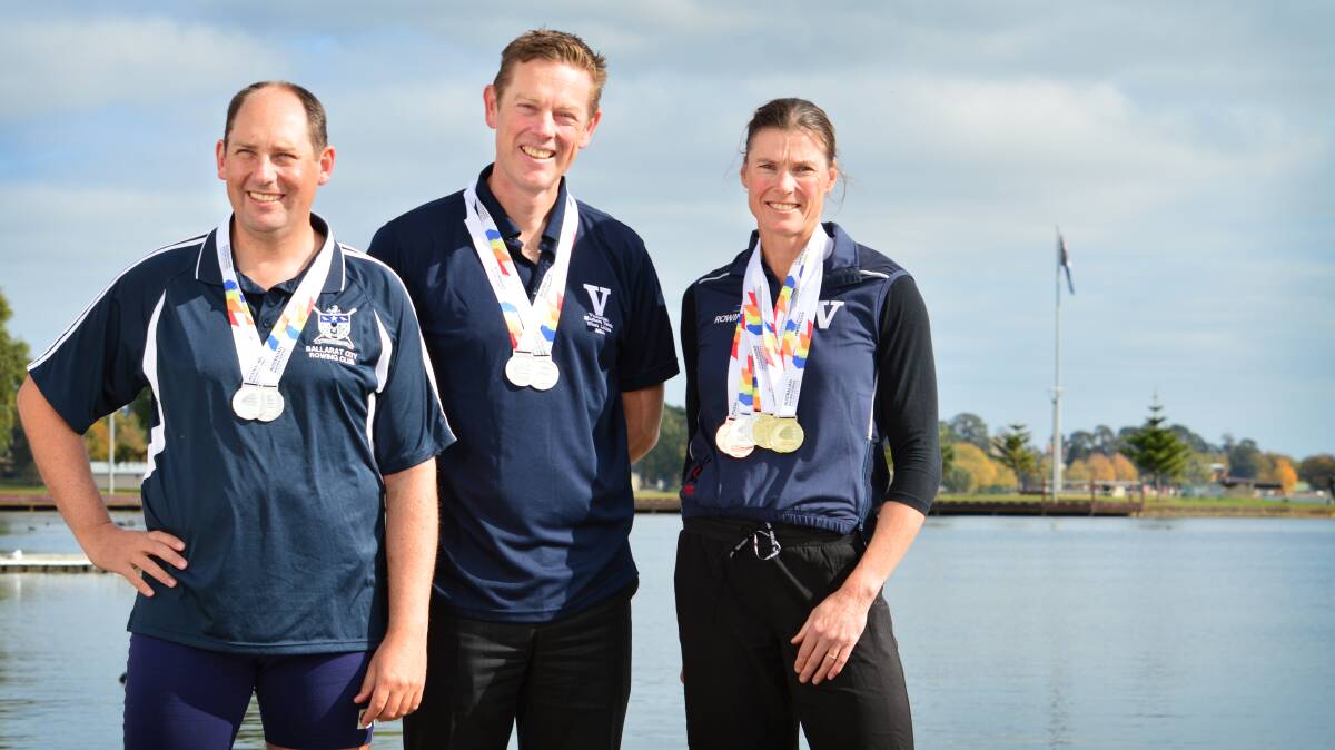 ON THE PODIUM: Ballarat’s Australian Masters Rowing Championships medallists Jamie McDonald, left, John King and Lee-anne Martin, who will use the achievements as a launching pad to the world masters on Lake Wendouree in October. PICTURE: DYLAN BURNS