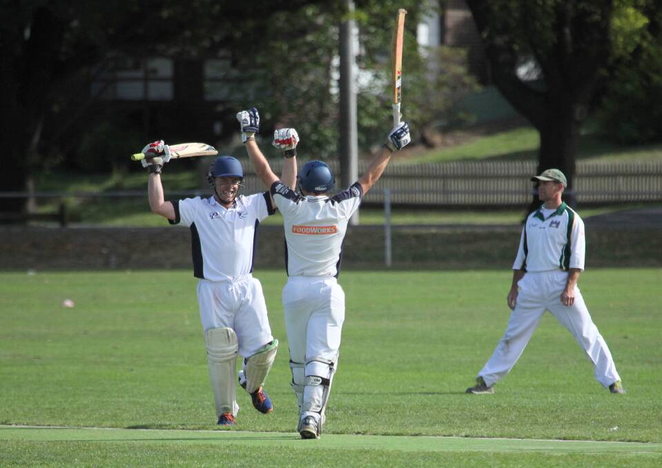 Victory at last: Ballan captain Mick Nolan celebrates with Jarryd Graham immediately after Nolan hit the winning runs. Picture: Chris Thom