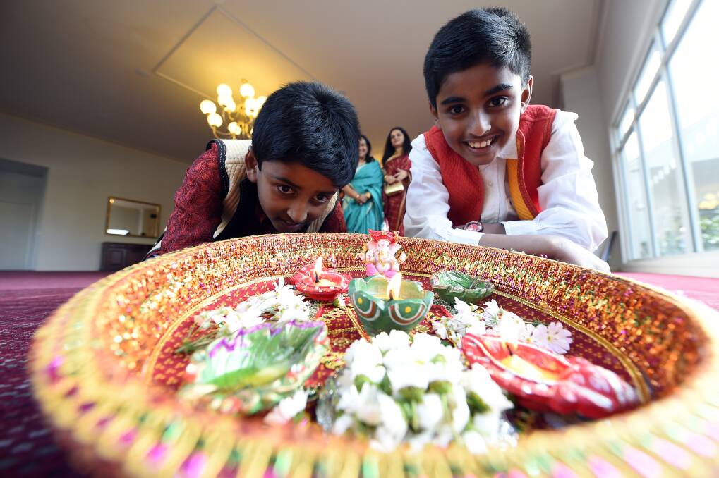 Festive: Brothers Tim, 8, and Youhanna Mani, 9, will celebrate the traditional Indian festival of lights, known as Diwali. PICTURE: JUSTIN WHITELOCK