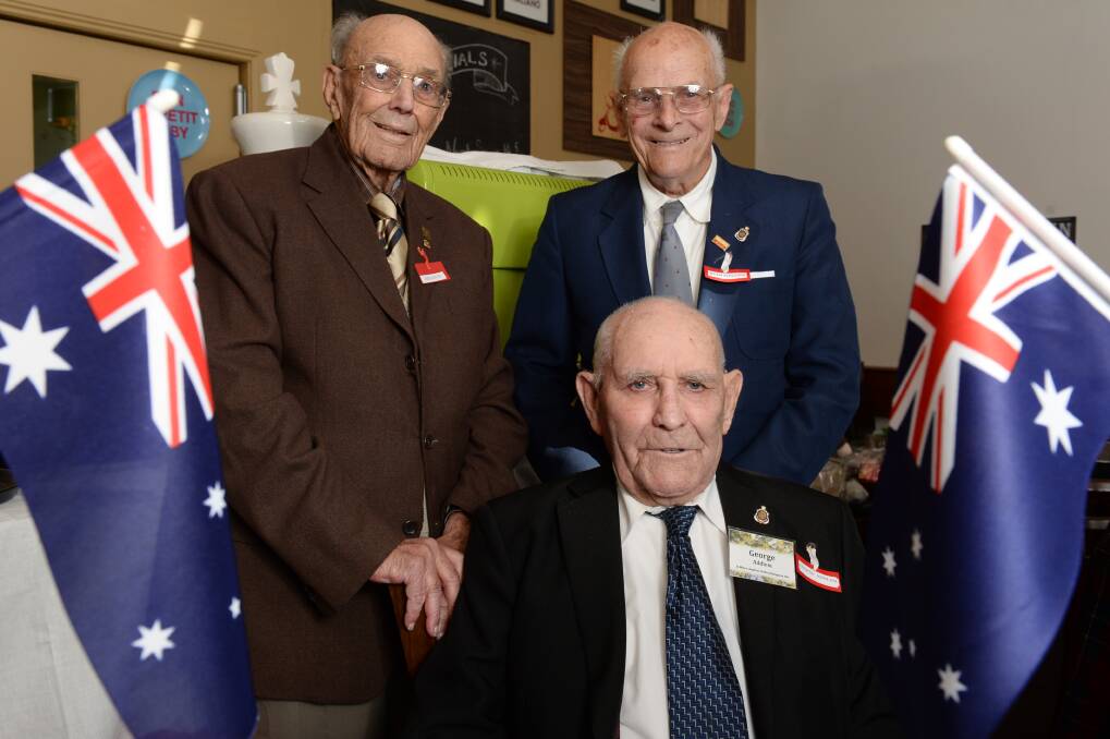 Brothers in arms: Surviving World War II Eighth Battalion veterans Jack Oliver, George Addlem and Stan Phillips at their annual reunion on Sunday.
PICTURE: KATE HEALY